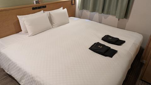 Candeo Hotels bed and loungewear