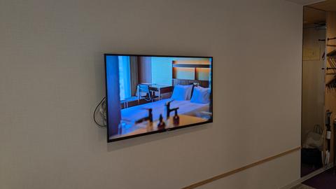 Wall-mounted TV close-up